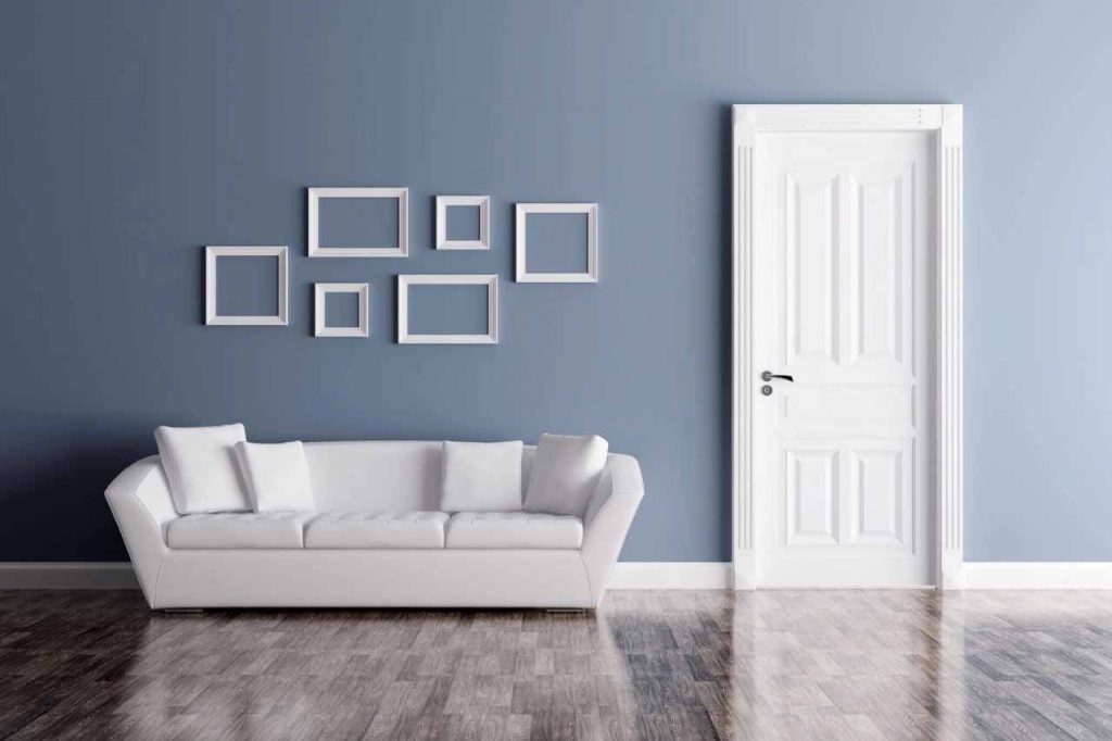 Modern living room with blue painted wall and smooth interior paint finish